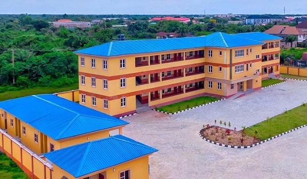 Rebuilding classrooms and a library to welcome 840 children back to school after flood damage. Ultra modern 18-classroom school, recreational facilities